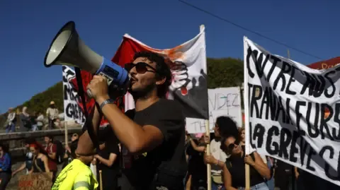Countrywide Walkouts Begin Against Budget Cuts